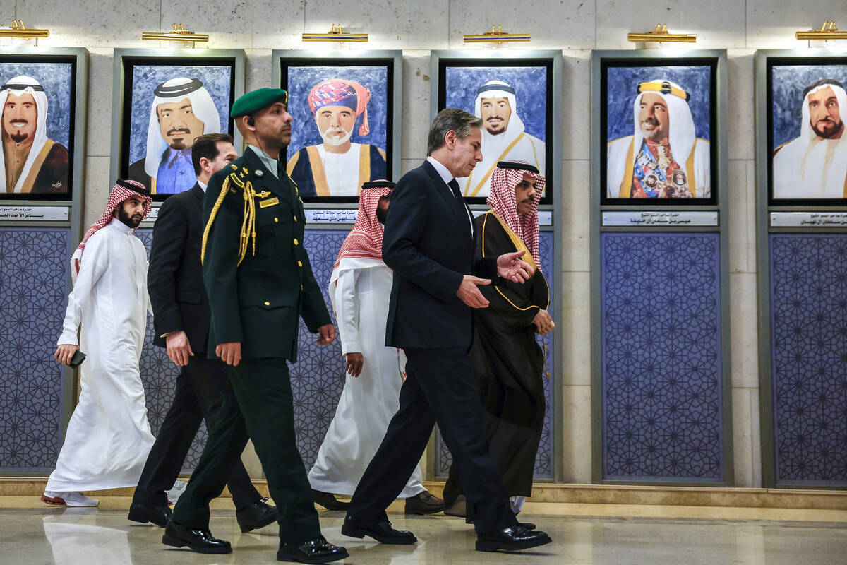 Saudi Arabia's Foreign Minister Prince Faisal bin Farhan bin Abdullah, right, and U.S. Secretar ...