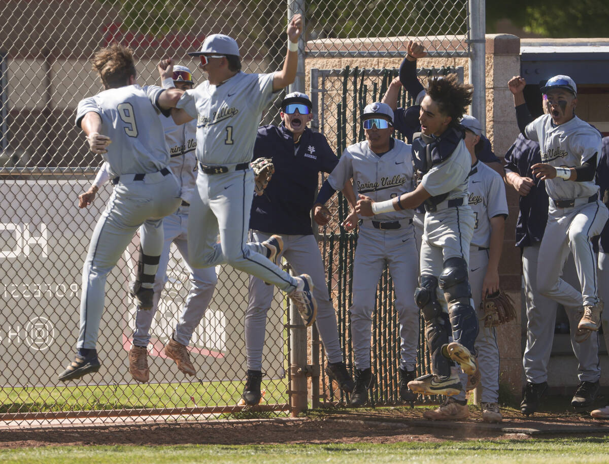 Spring Valley's Jack Rieckmann (9) celebrates his home run with teammates during a baseball gam ...
