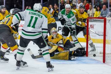 Golden Knights goaltender Logan Thompson (36) watches a shot score by the Dallas Stars during t ...