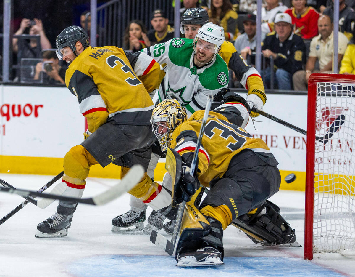 Golden Knights goaltender Logan Thompson (36) deflects a shot by the Dallas Stars during the se ...
