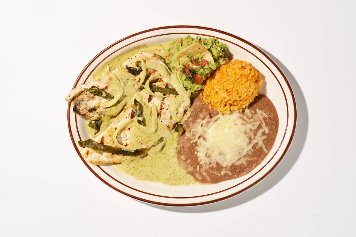 Pollo con rajas (creamy poblano chicken) from Lindo Michoacan, which is opening an outpost on M ...
