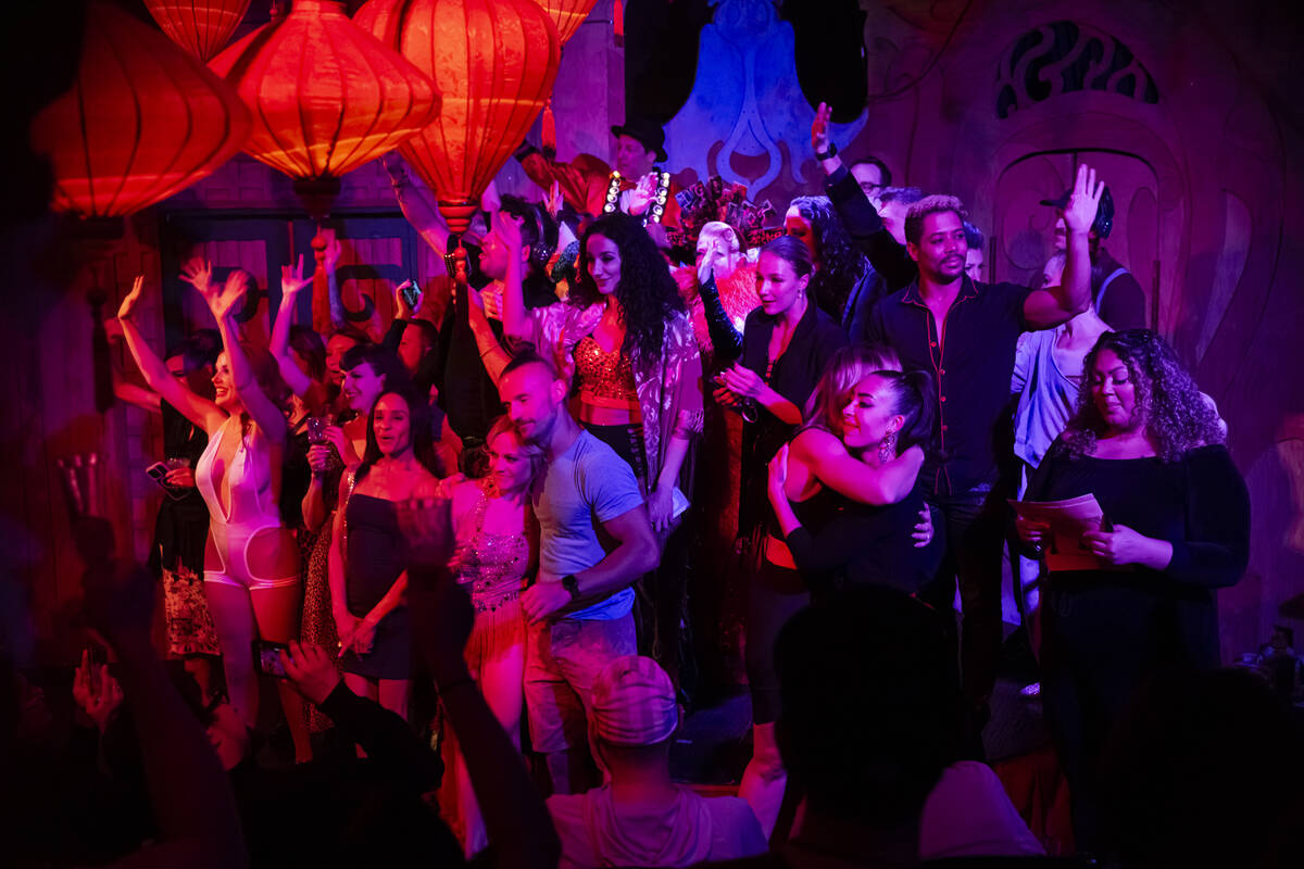 Cast members gather for a final toast on the closing night of Lost Spirits Distillery at Area15 ...