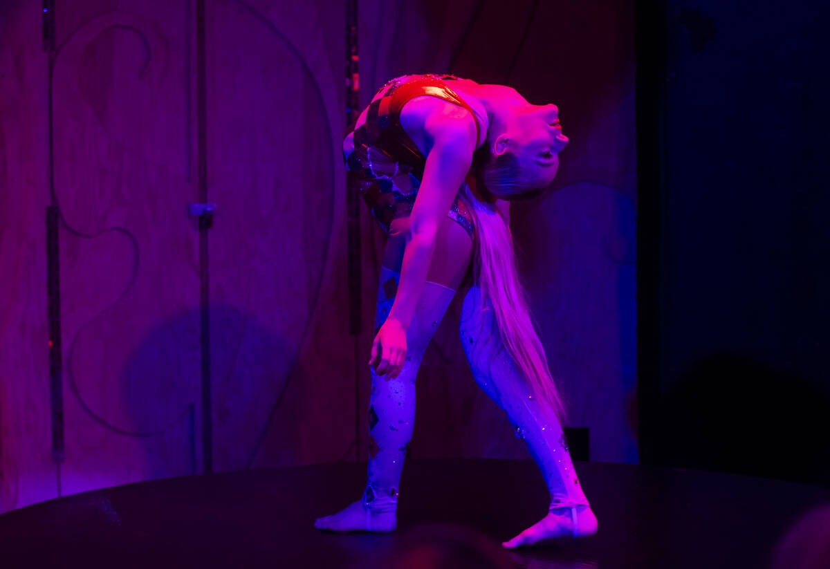 Contortionist Jordan McKnight performs during the closing night of Lost Spirits Distillery at A ...