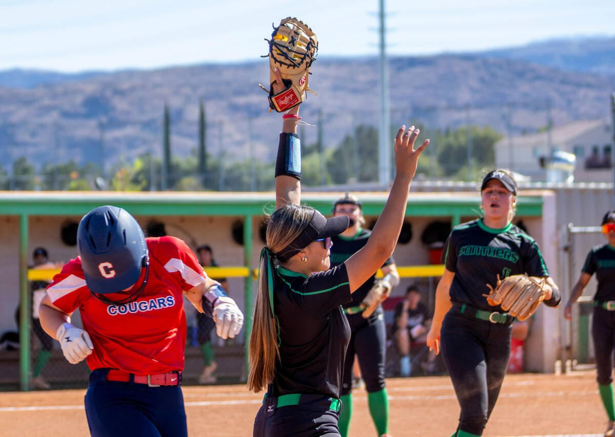 Palo Verde infielder Haley Kearnes (8) makes a grab ahead of a Coronado runner with an out at f ...
