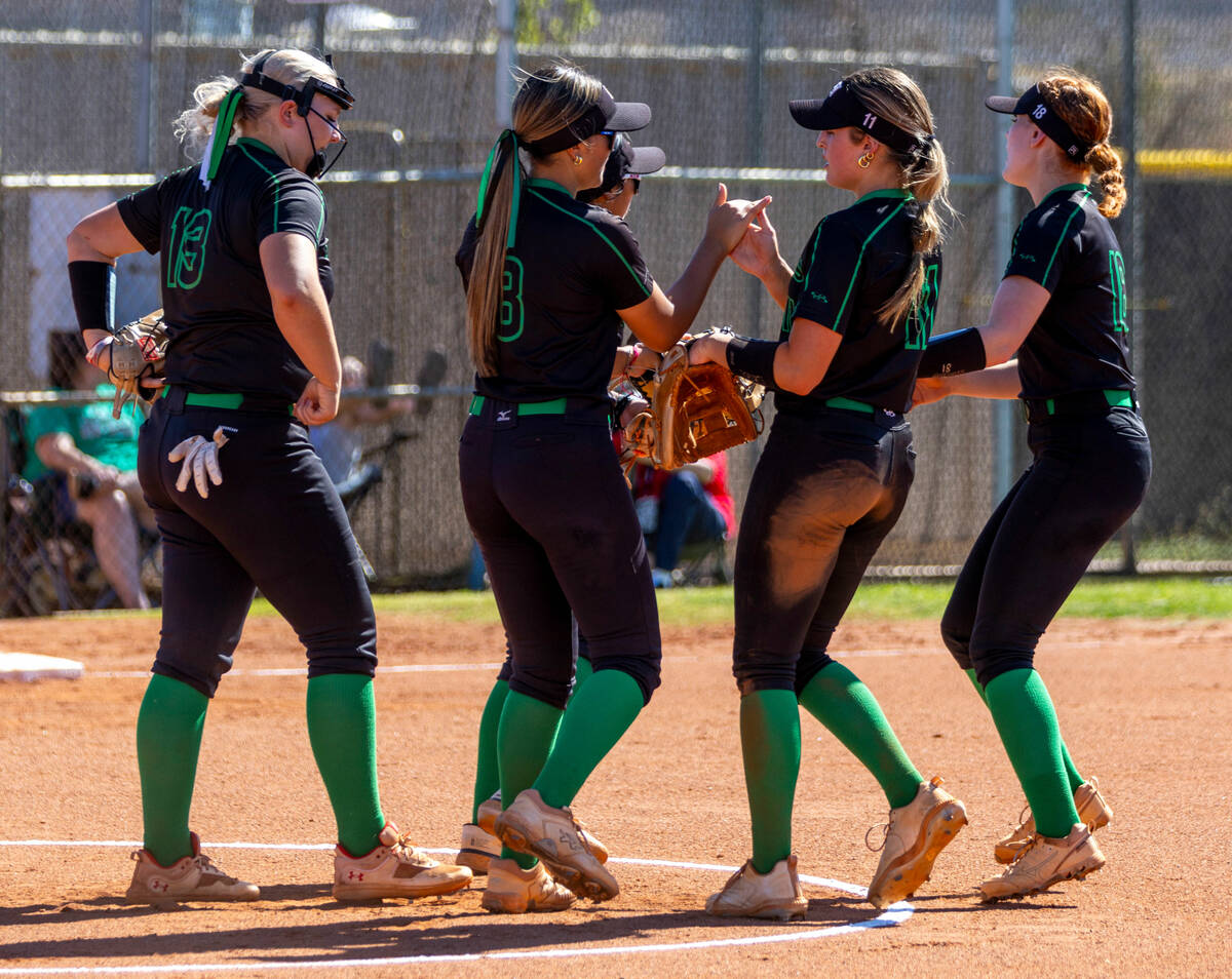 Palo Verde infielders come together on the mound after retiring Coronado batters during the sec ...