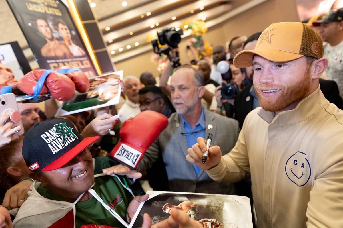 Canelo Alvarez signs autographs for fans after arriving to MGM Grand ahead of his super middlew ...