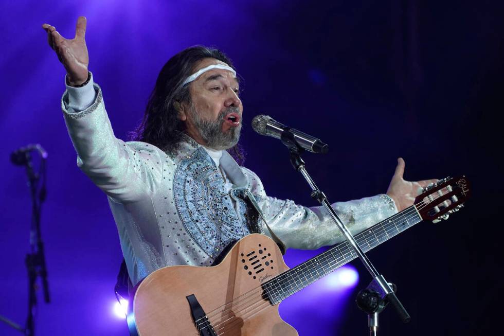 Los Bukis, a Mexican band led by singer Marco Antonio Solis, perform in concert at Azteca Stadi ...