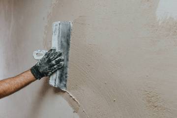 When patching stucco, avoid the premixed kind because often it’s just not the right text ...