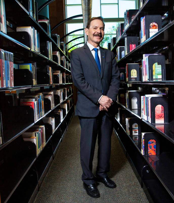 Federico Zaragoza, president of the College of Southern Nevada, poses for a portrait in the lib ...