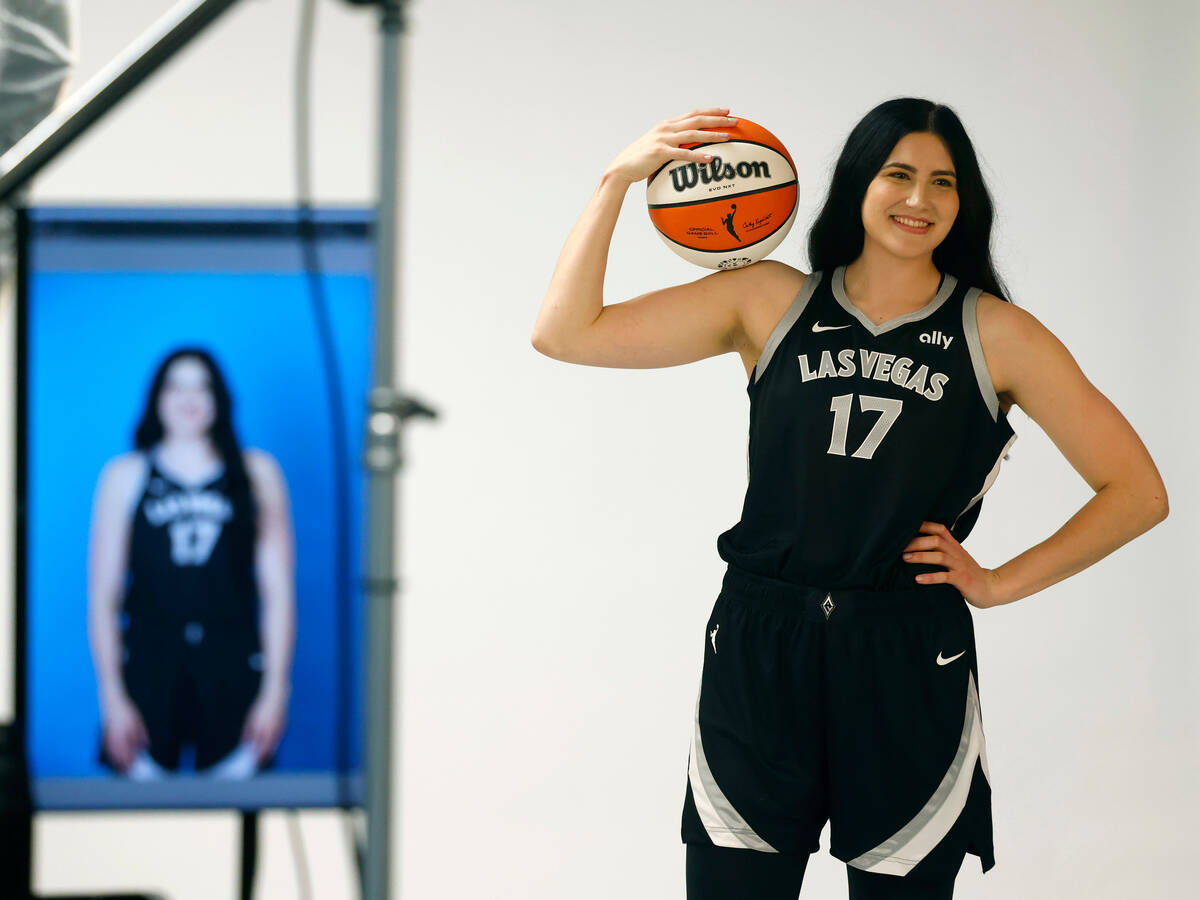 Las Vegas Aces center Megan Gustafson (17) poses for a photo during Aces media day, on Friday, ...