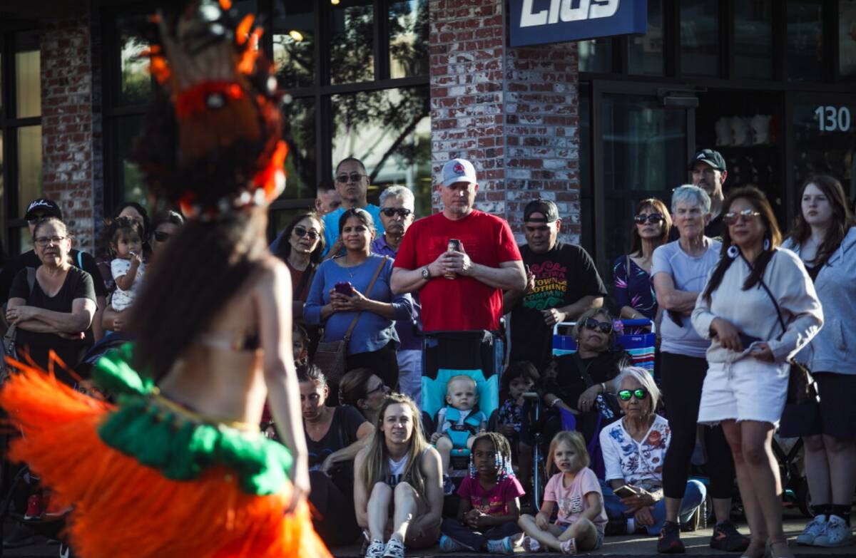 The crowd watches a performance at the Lei Day Parade, a celebration of Asian American and Paci ...