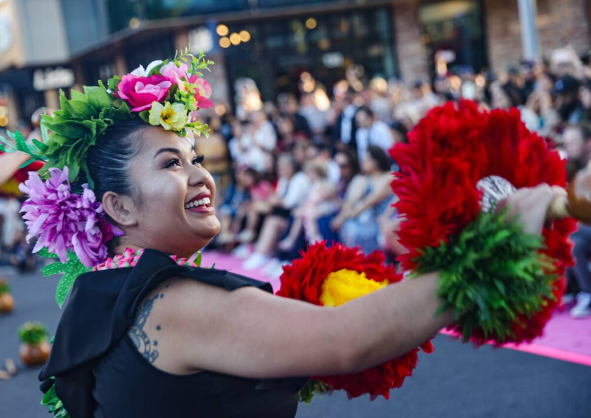 A dancer with the Na Hula Hali’a Aloha Cultural Preservation Society performs during the Lei ...