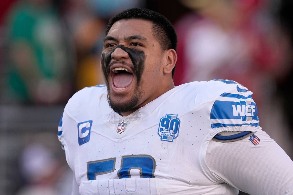 Detroit Lions offensive tackle Penei Sewell takes the field before the NFC Championship NFL foo ...