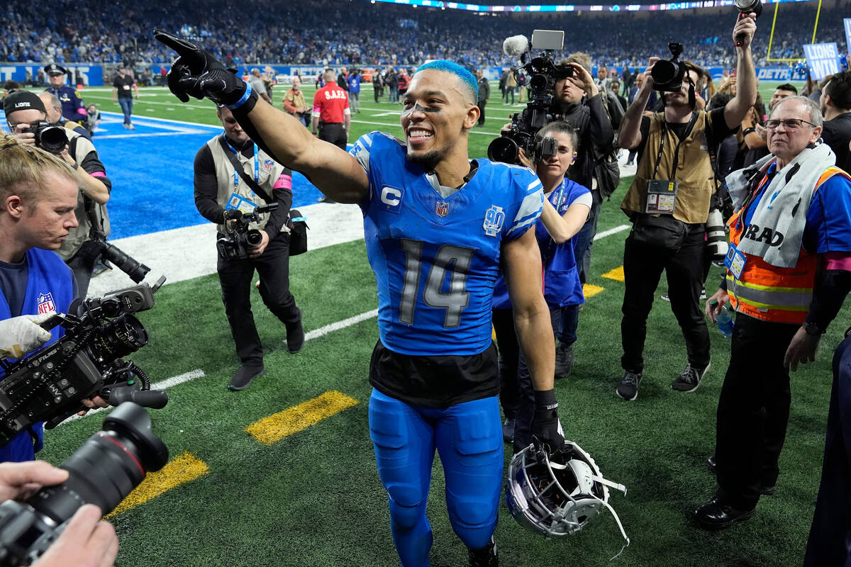Detroit Lions wide receiver Amon-Ra St. Brown leaves the field following an NFL football NFC di ...