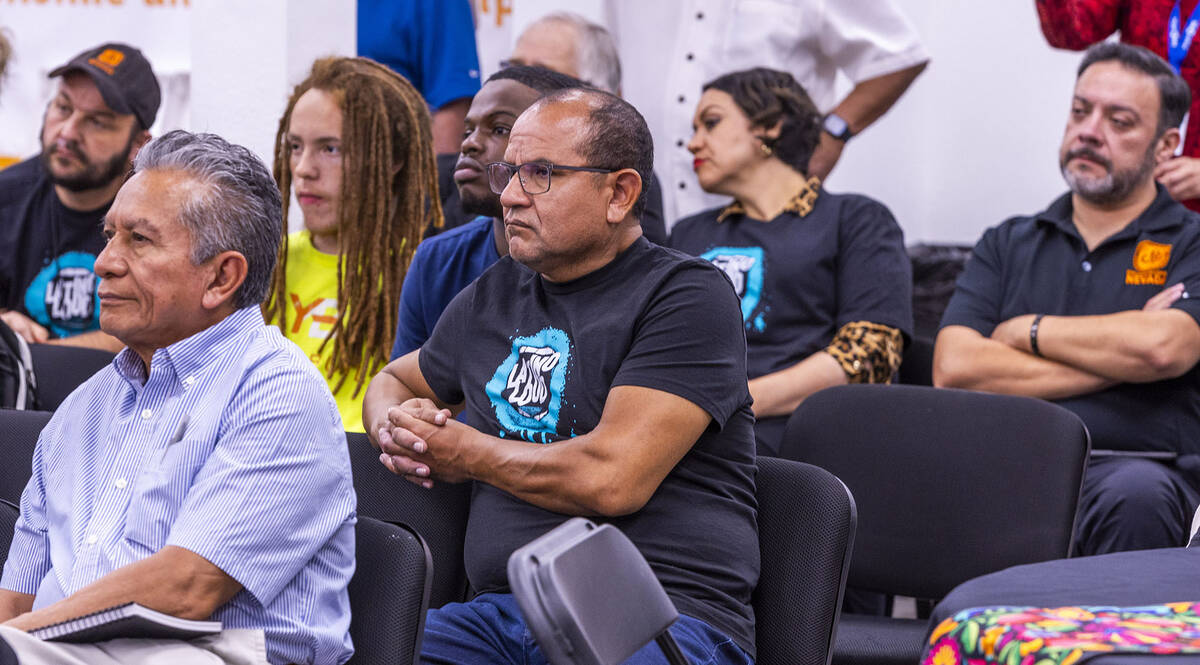 Participants listen to speakers during the 2024 Latino Loud nonpartisan voter registration, eng ...