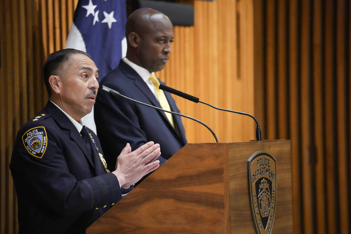 New York Police Dept. Assistant Chief at Emergency Services Unit Carlos Valdez, left, is joined ...