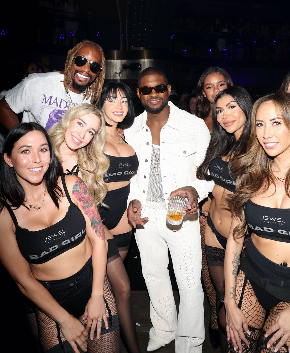 Lil Jon (3rd L) and Usher (C) attend "Bad Girl: 20 Years Of Confessions" at Jewel Nightclub at ...
