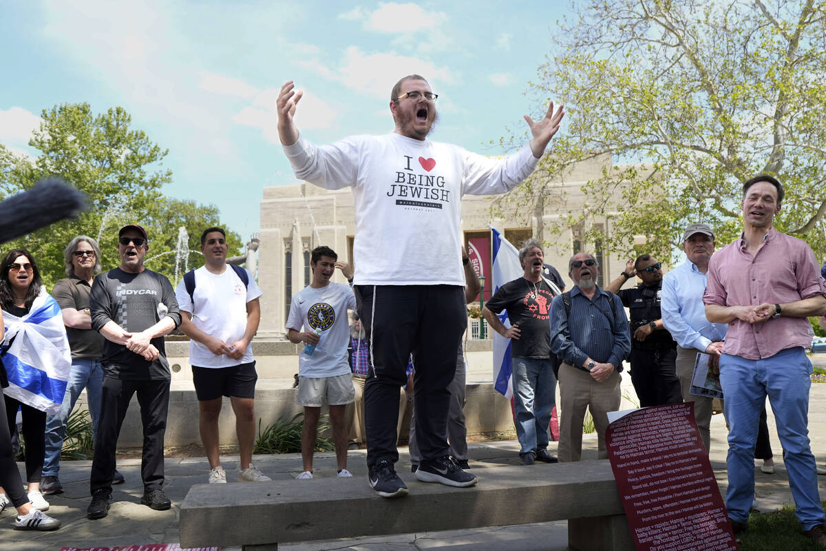 Rabbi Levi Cunin, with Chabad on Campus, speaks during a pro-Israel rally at Indiana University ...