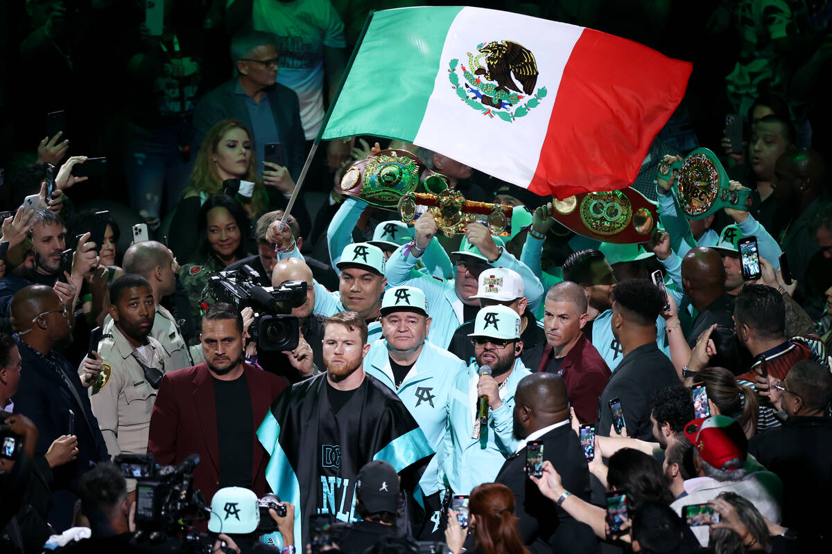 Canelo Álvarez heads toward the ring for an undisputed world super middleweight championsh ...