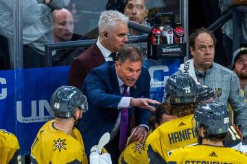 Golden Knights head coach Bruce Cassidy talks with players on a timeout against the Dallas Star ...