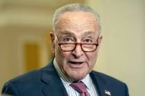 FILE - Sen. Majority Leader Chuck Schumer, D-N.Y., talks after a policy luncheon on Capitol Hil ...