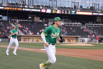 Oakland Athletics second baseman Zach Gelof takes the field before a baseball game against the ...