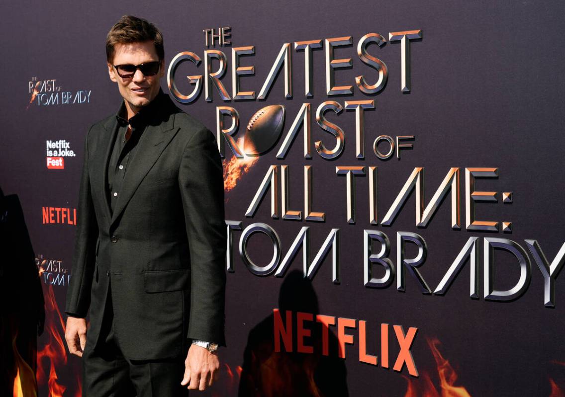 Tom Brady poses at "The Greatest Roast of All Time: Tom Brady" at the Kia Forum, Sund ...