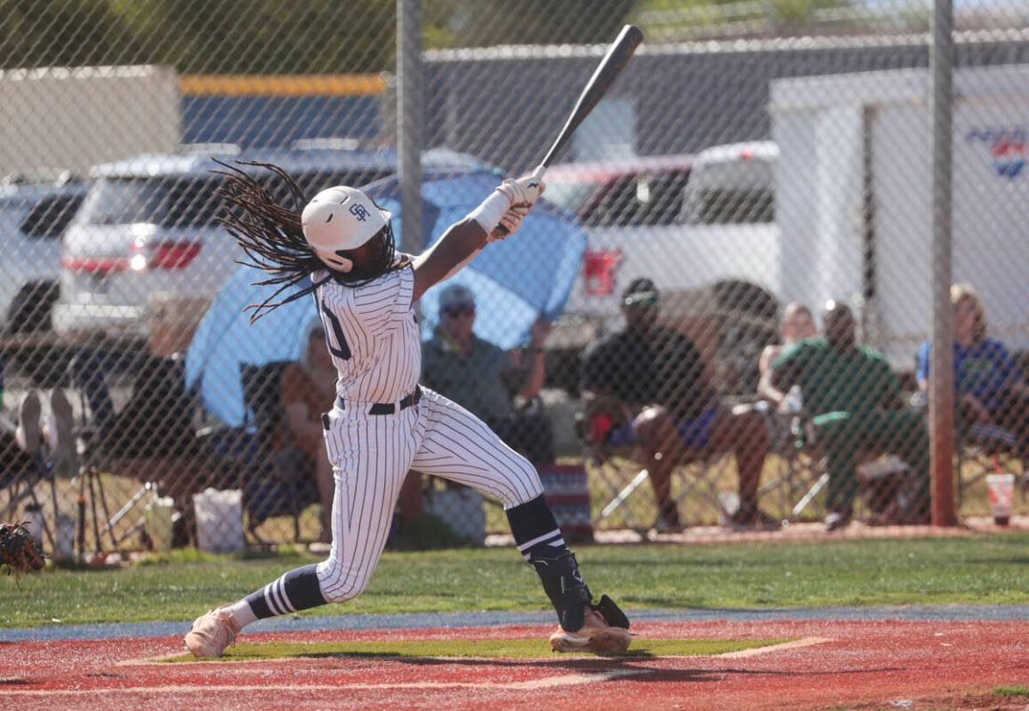 Shadow Ridge's Christian Wilkes (30) hits the ball on a pitch from Green Valley during a high s ...