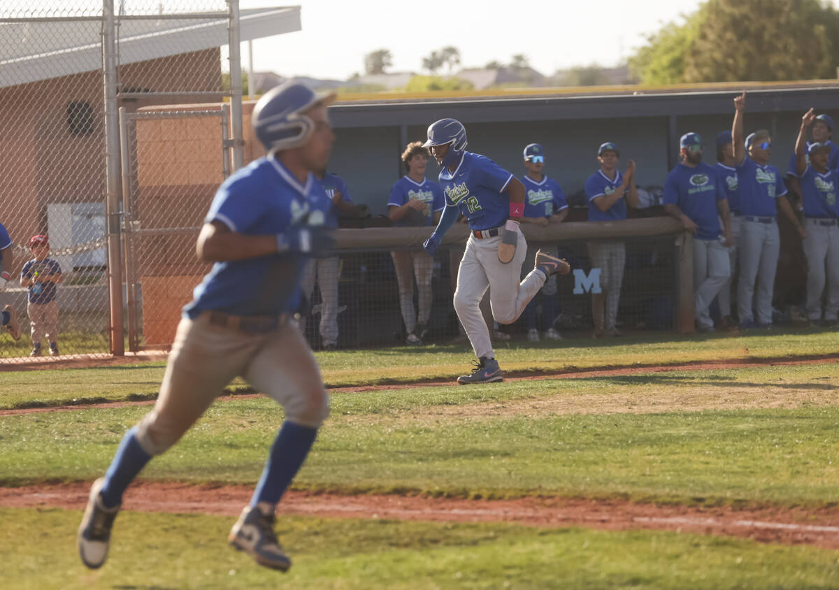 Green Valley's infielder Caden Kirby (12) heads to first base to score a run during a high scho ...