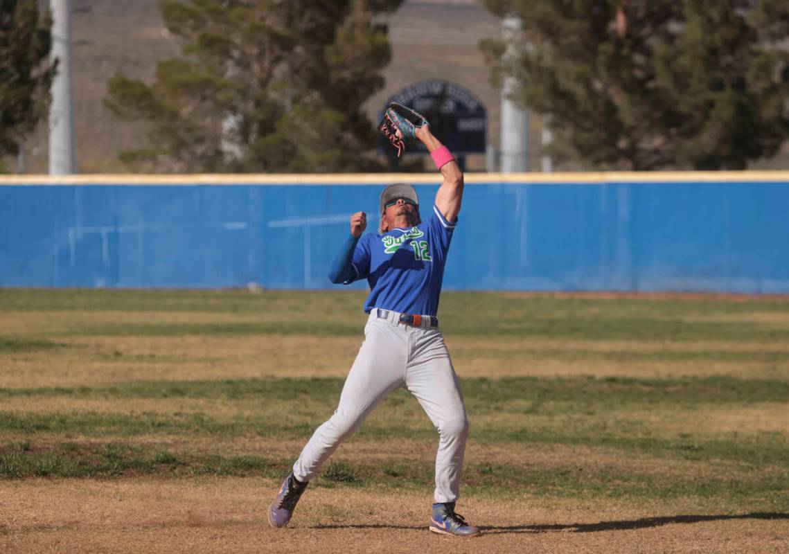 Green Valley's infielder Caden Kirby (12) catches a fly ball from Shadow Ridge during a high sc ...