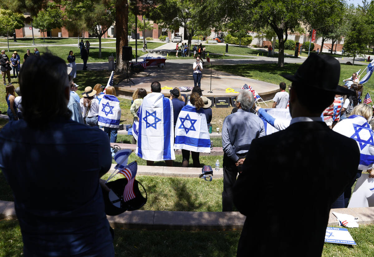 People stand during the national anthem of Israel during Stand Against Hate Rally, supporting J ...