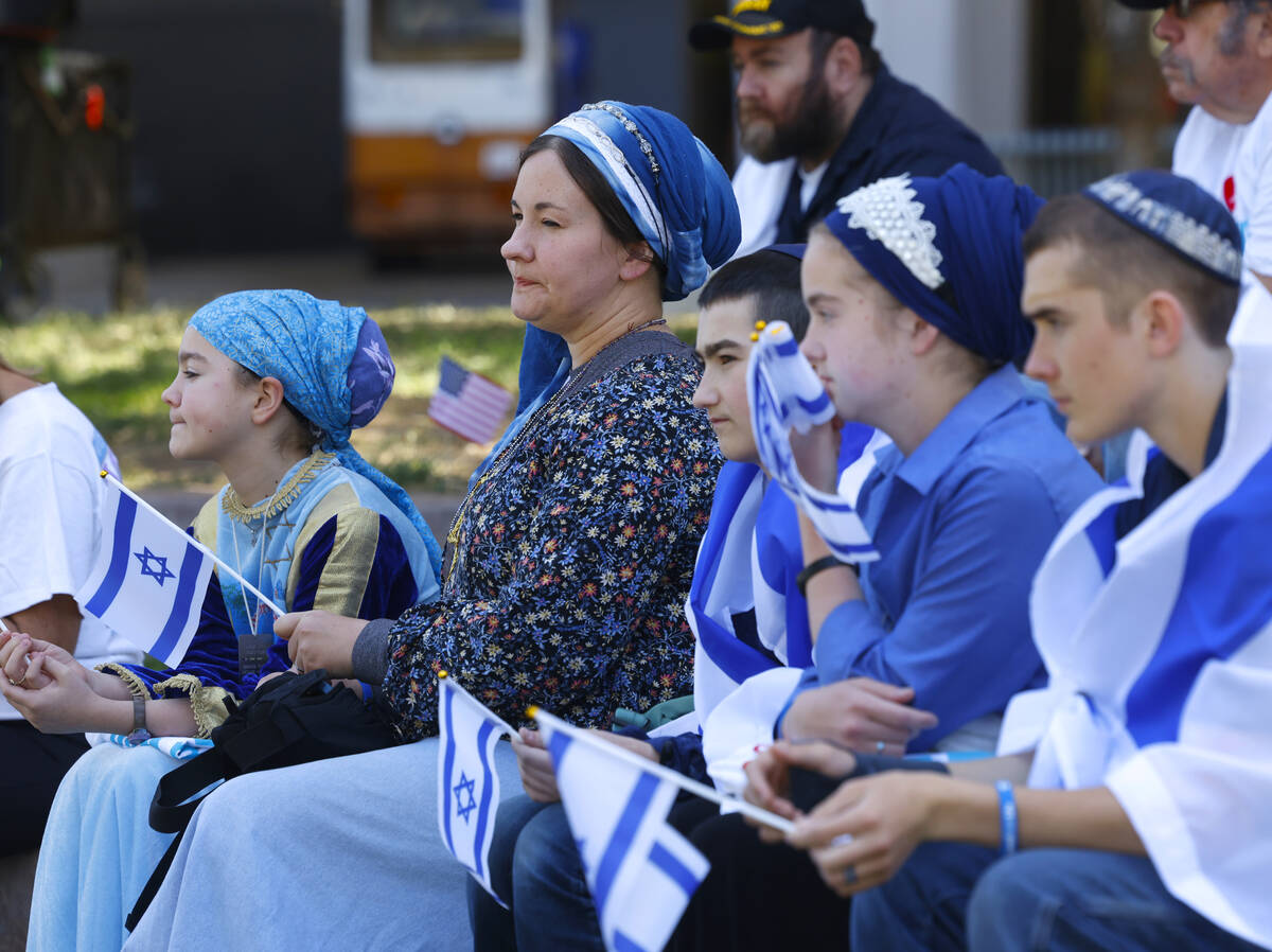 Lydia Netan, second left, attends Stand Against Hate Rally, supporting Jewish college students, ...