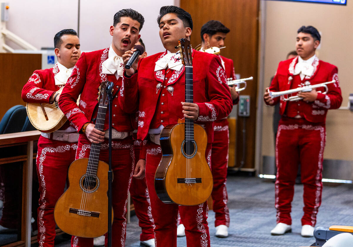 Mariachi Juvenil Herencia Michoacán members perform the National Anthem to open the City o ...