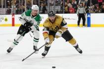 Golden Knights right wing Jonathan Marchessault (81) and Stars defenseman Thomas Harley (55) dr ...