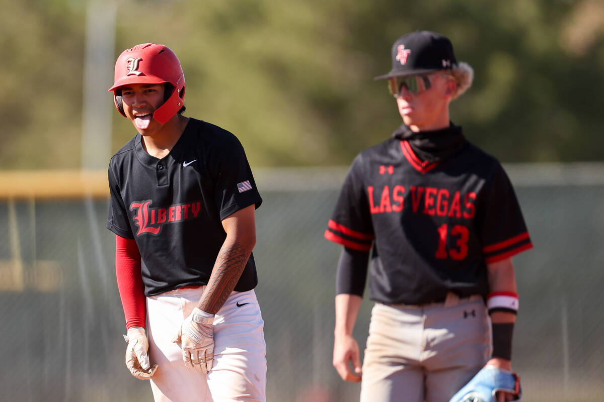 Liberty's Jaydrien Klein-Baker (9) celebrates after hitting a double while Las Vegas' Kyle Iver ...