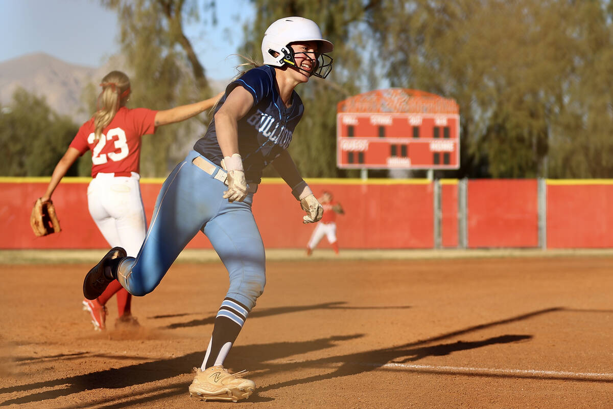 Centennial's Ashley Madonia (3) rounds third base during a high school softball game against Ce ...