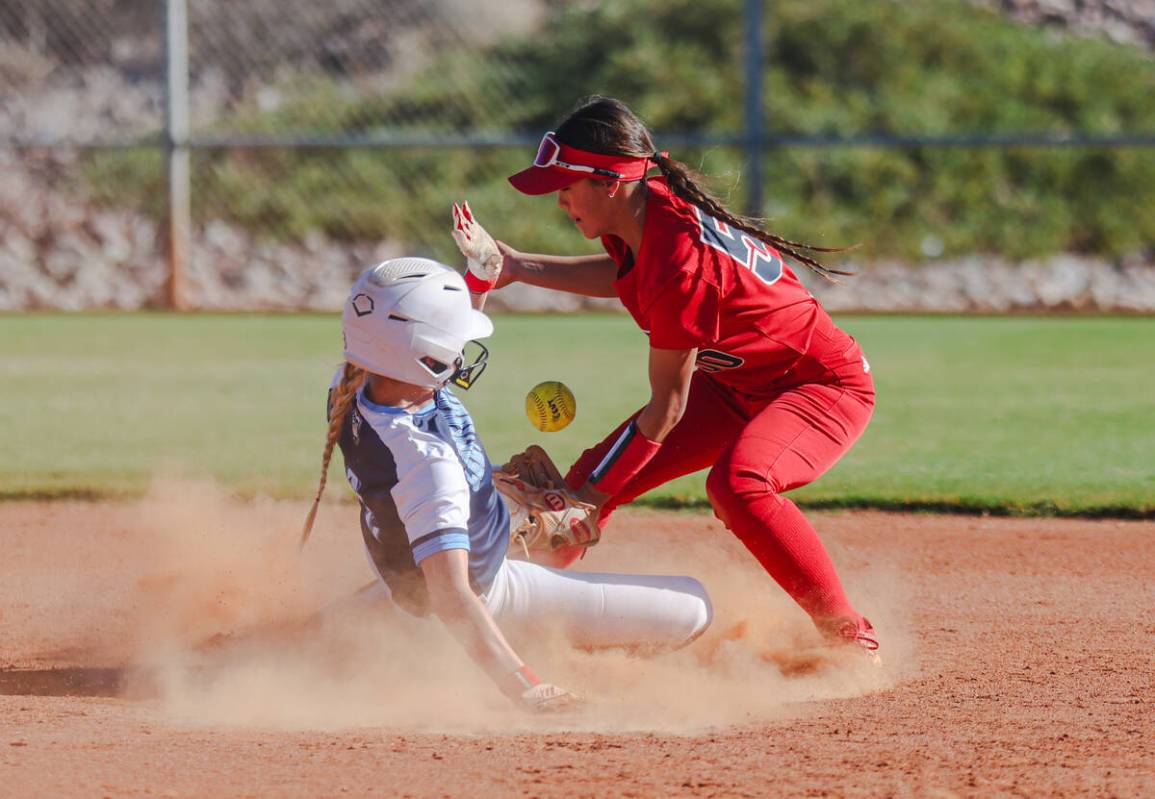 Centennial High School’s Ashley Madonia (3) steals second base against Liberty High Scho ...