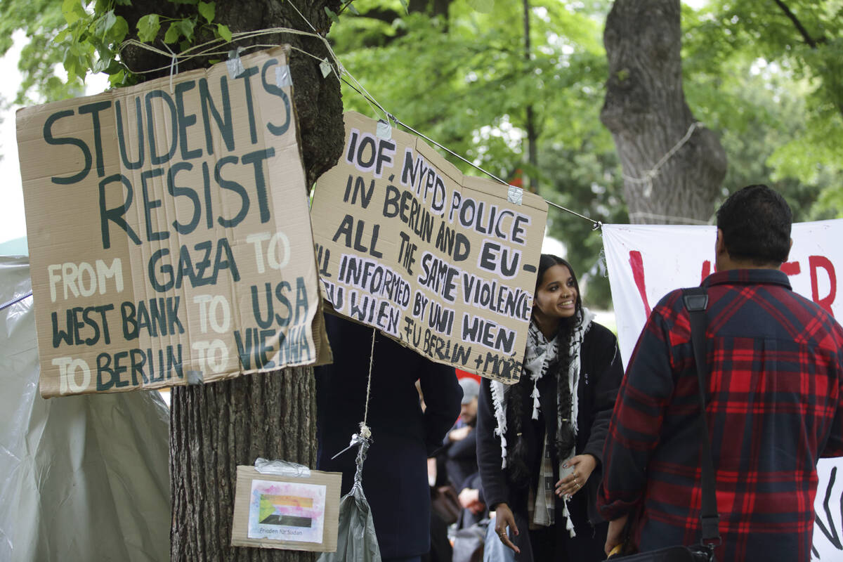 People attend a pro-Palestinians protest camp at the Vienna University Campus in Vienna, Austri ...