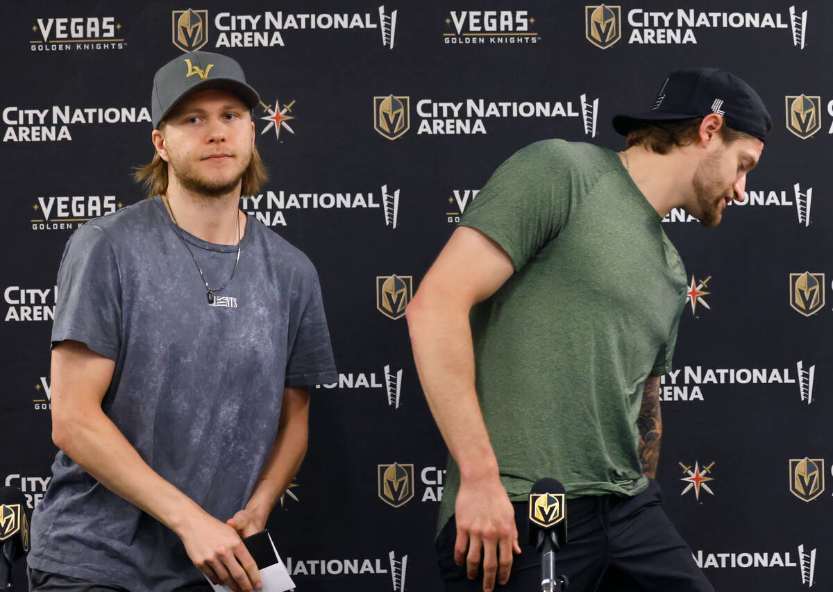 Golden Knights center William Karlsson, left, and goaltender Adin Hill leave the podium after t ...