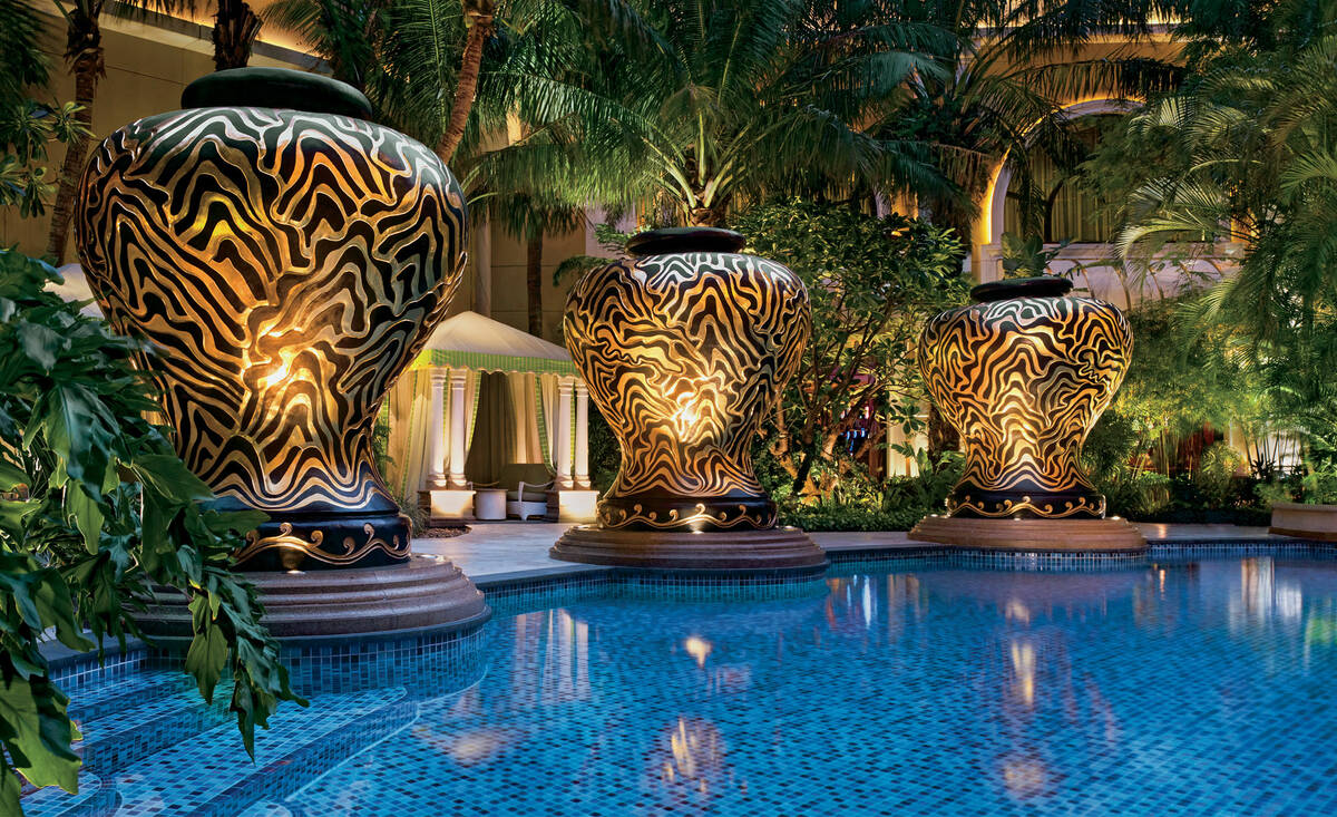 Giant versions of classic Chinese ceramics were added around the pool at the Wynn Macau. (Photo ...