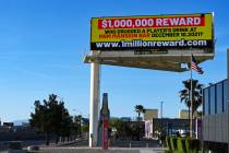 A billboard along I-15 near Russell Road Tuesday, May 7 2024, advertises a $1M reward from a hi ...