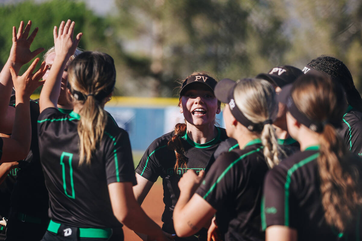 Palo Verde players cheer at the end of an inning during a Class 5A Southern Region high school ...