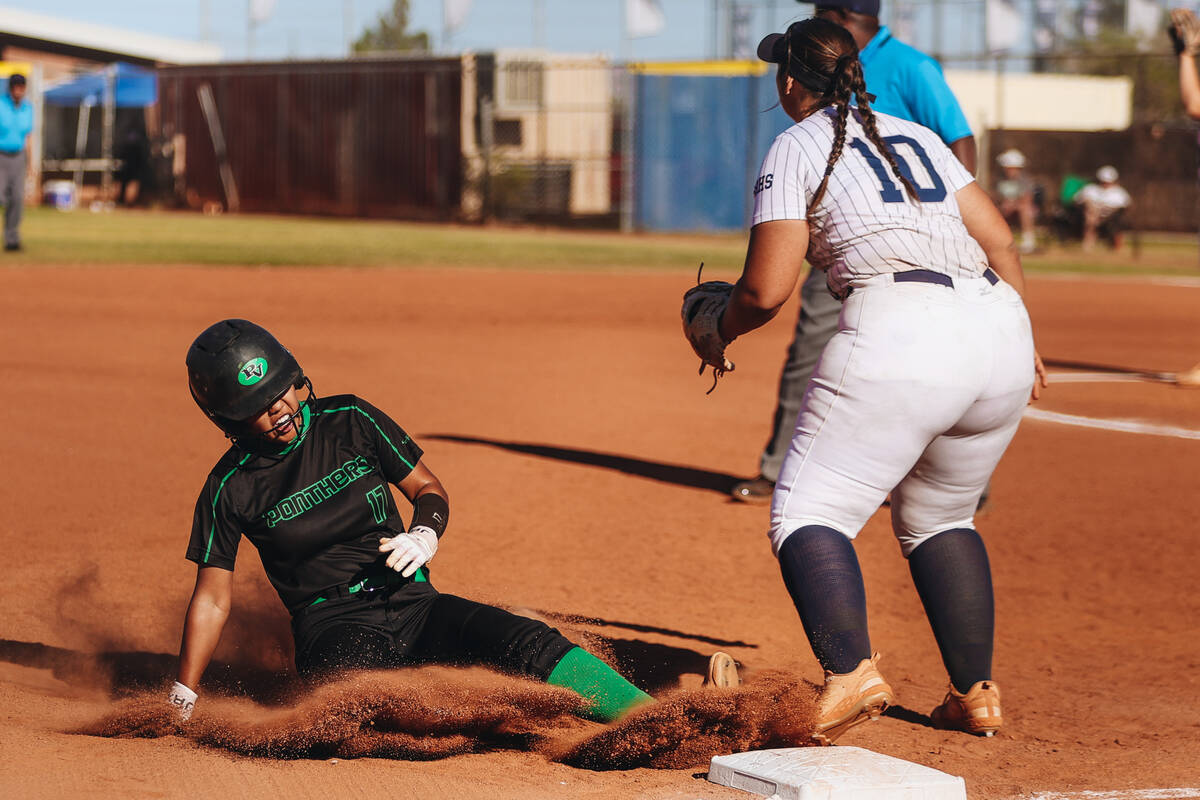 Palo Verde’s Makayla Enriquez (17) slides to third base during a Class 5A Southern Regio ...