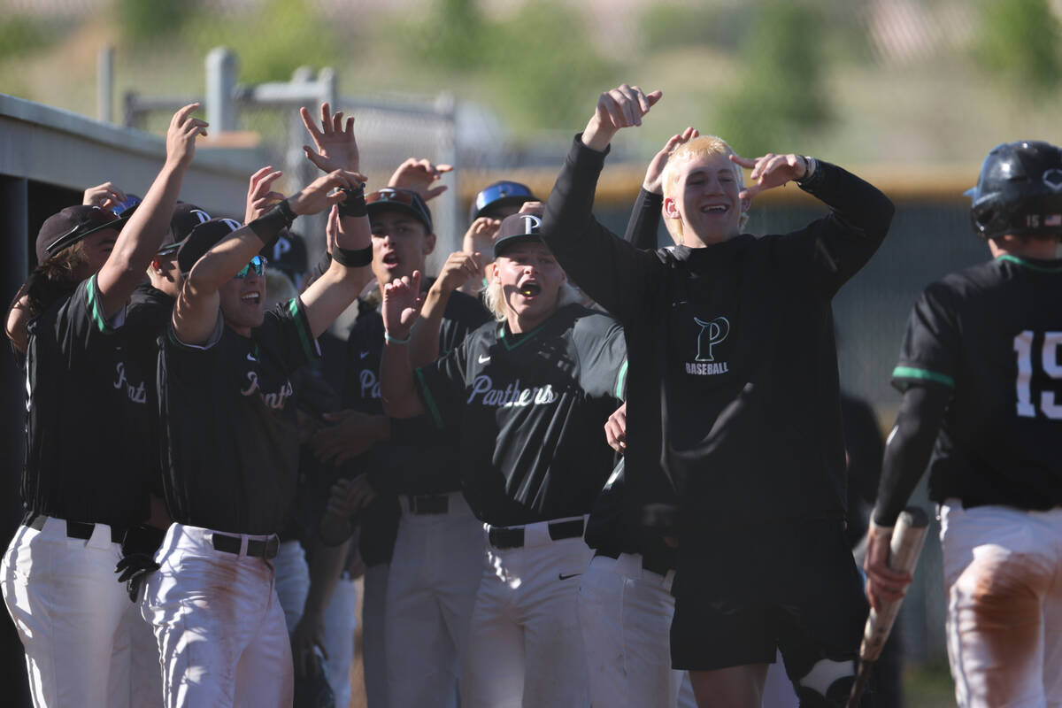 Palo Verde cheers in Drew Kaplan after he scored during a Class 5A high school baseball Souther ...