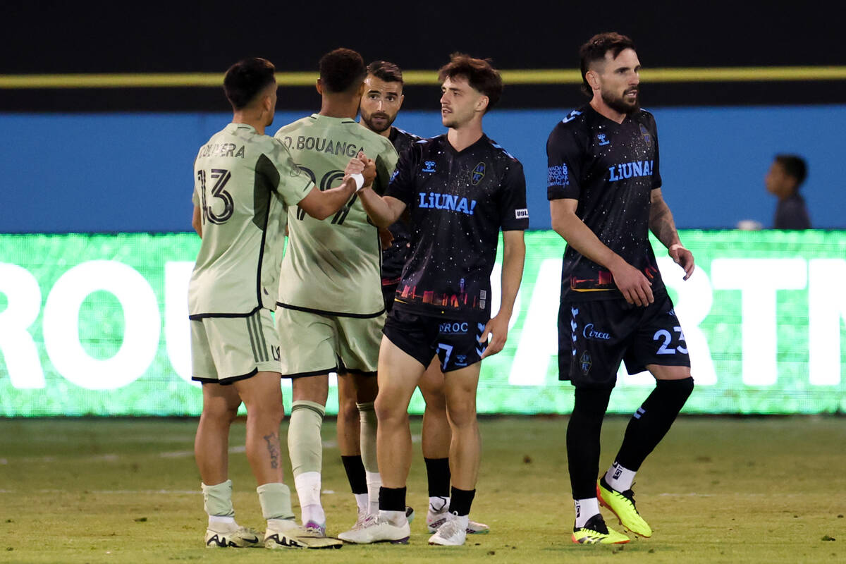 Los Angeles FC exchanges handshakes with Las Vegas Lights FC after winning a U.S. Open Cup roun ...