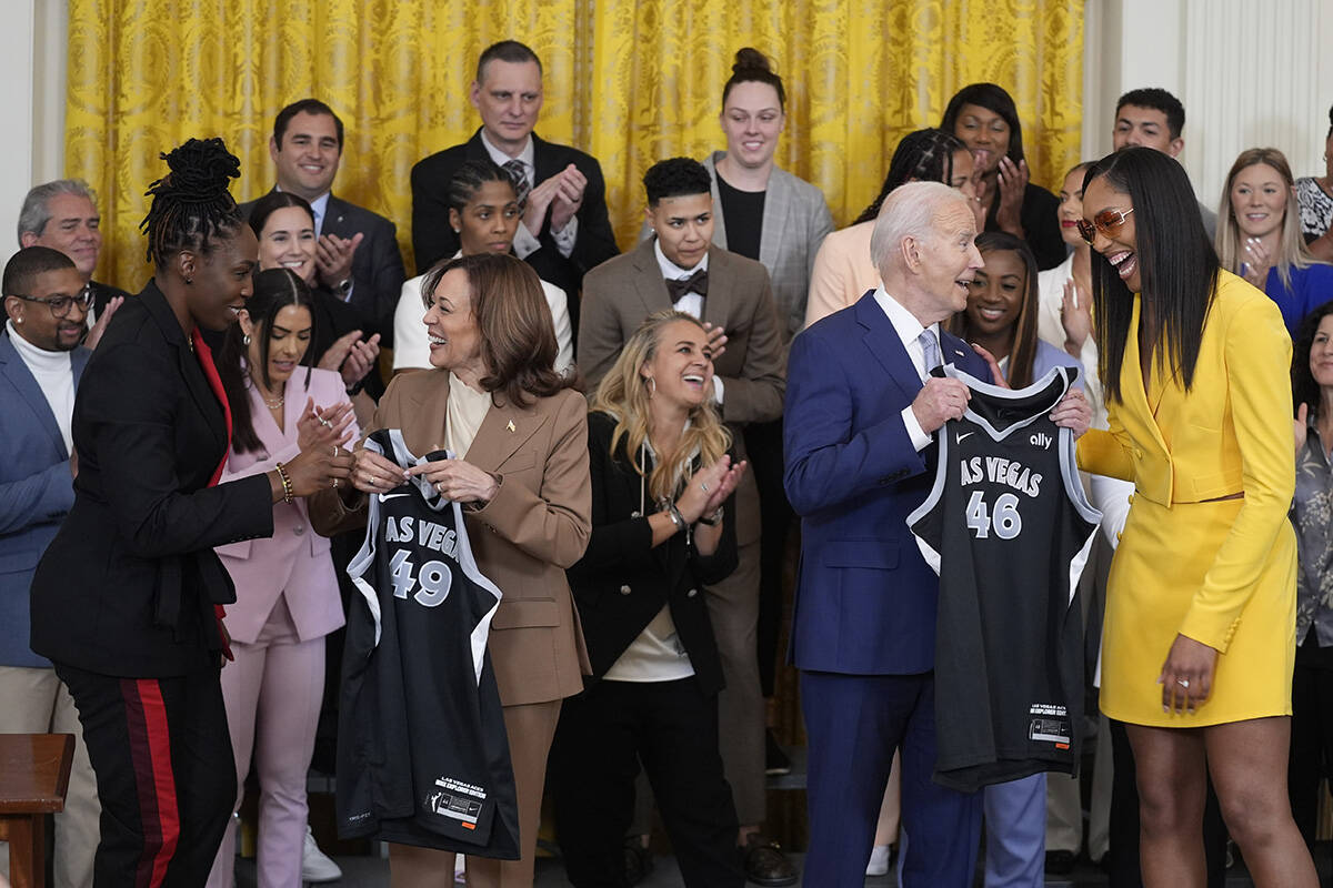 A'ja Wilson, right, and right, Chelsea Gray, left, of the WNBA's Las Vegas Aces, present jersey ...