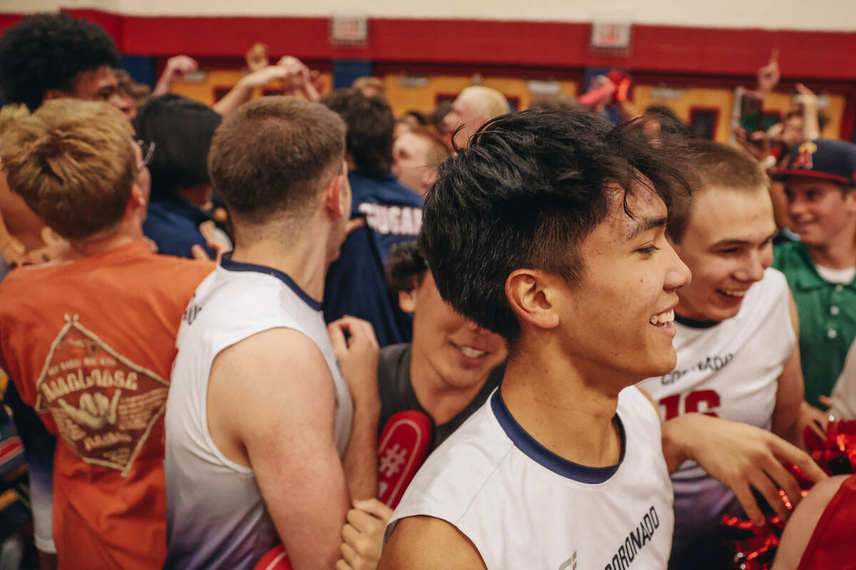 Coronado players and students from the student section celebrate Coronado winning during a Clas ...