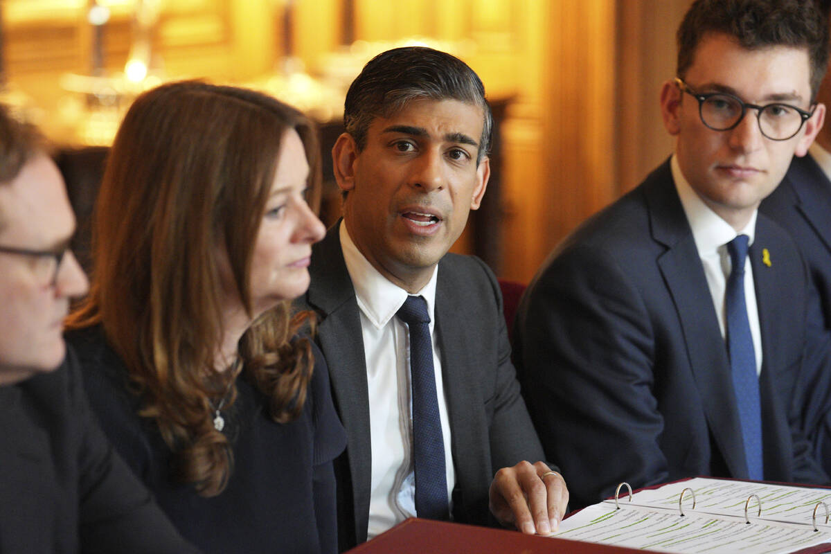 Britain's Prime Minister Rishi Sunak, center, and Education Secretary Gillian Keegan, center le ...