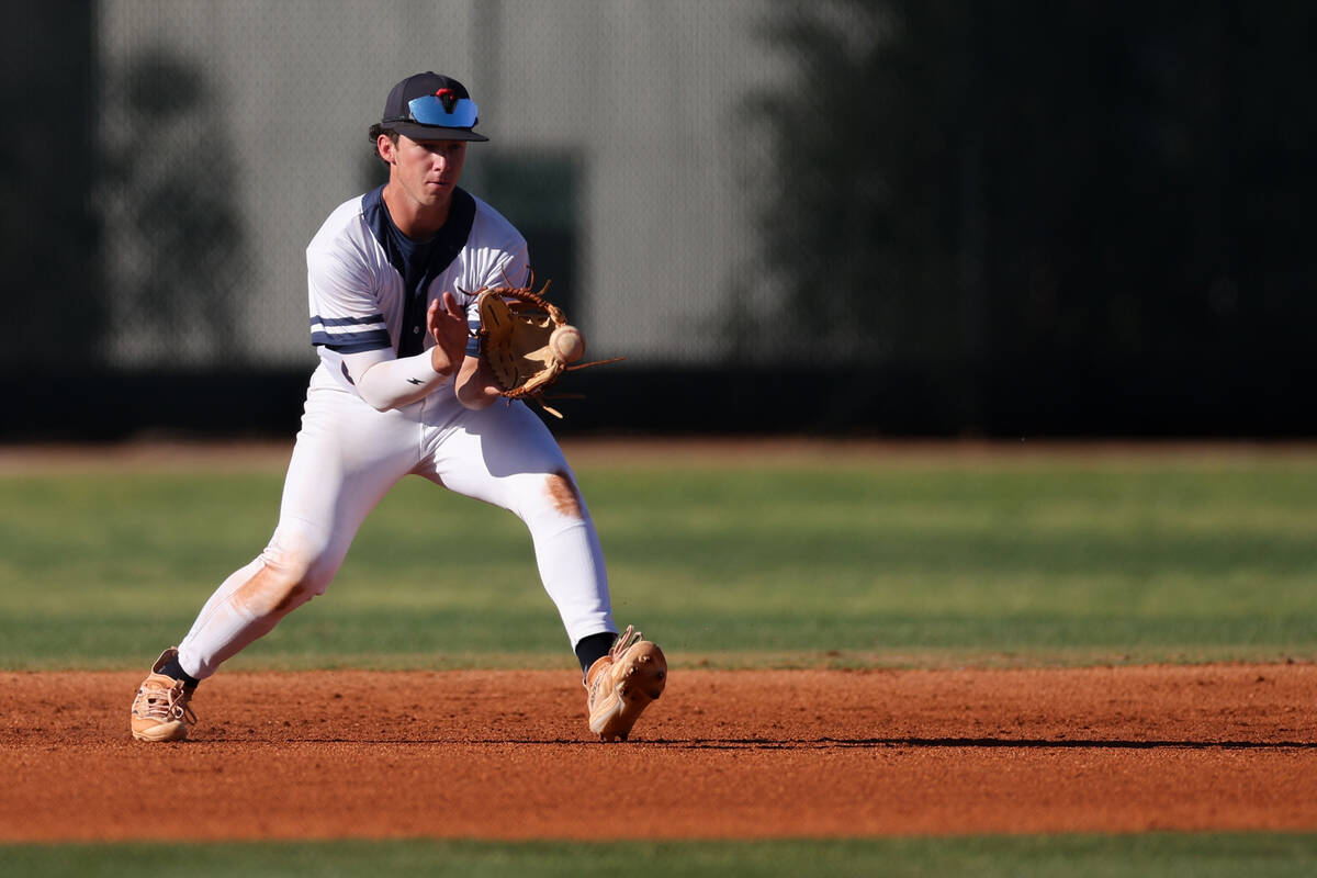 Coronado shortstop Louis Dion (6) catches for an out on Green Valley during a Class 5A high sch ...