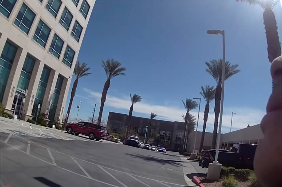 A screenshot from a Metropolitan Police Department body camera as police arrive at the fatal sh ...